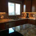 Kitchen remodel showing under cabinet lights